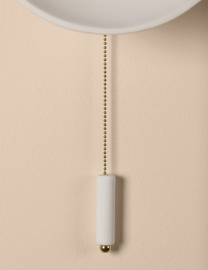Bacia Sconce styled in a room