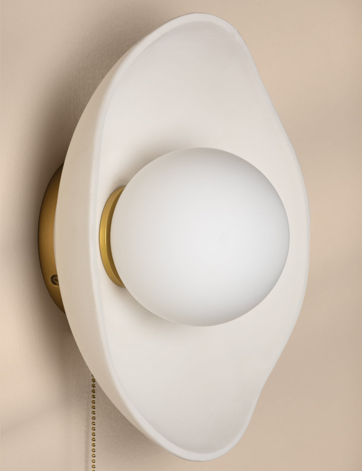 Bacia Sconce styled in a room