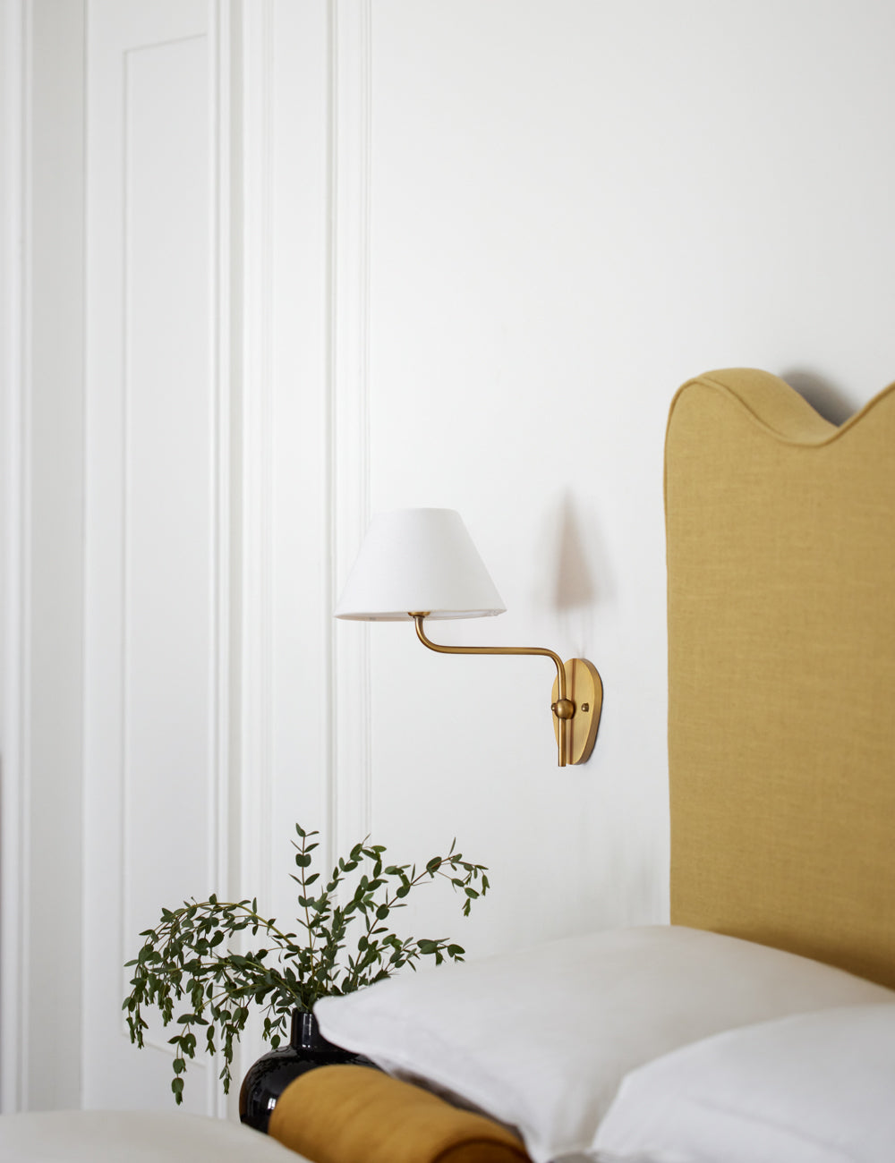 Magdalene Single Sconce styled in a room
