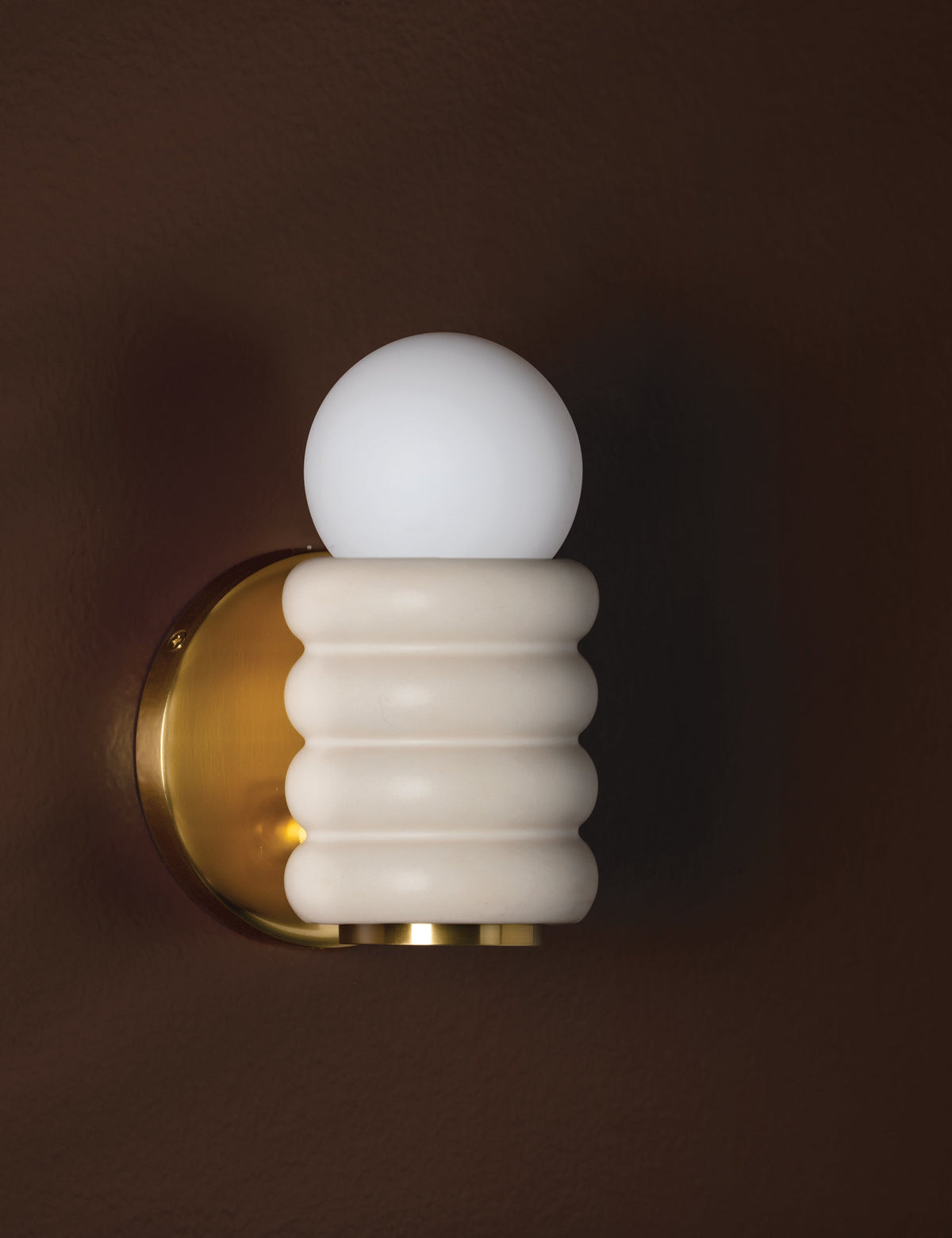 Bibi Sconce styled in a room