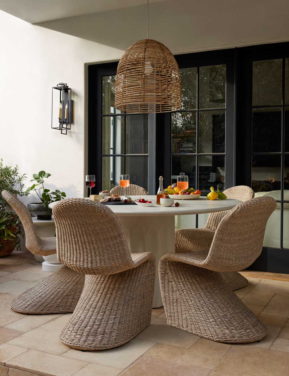 Judy Outdoor Sconce styled in a room