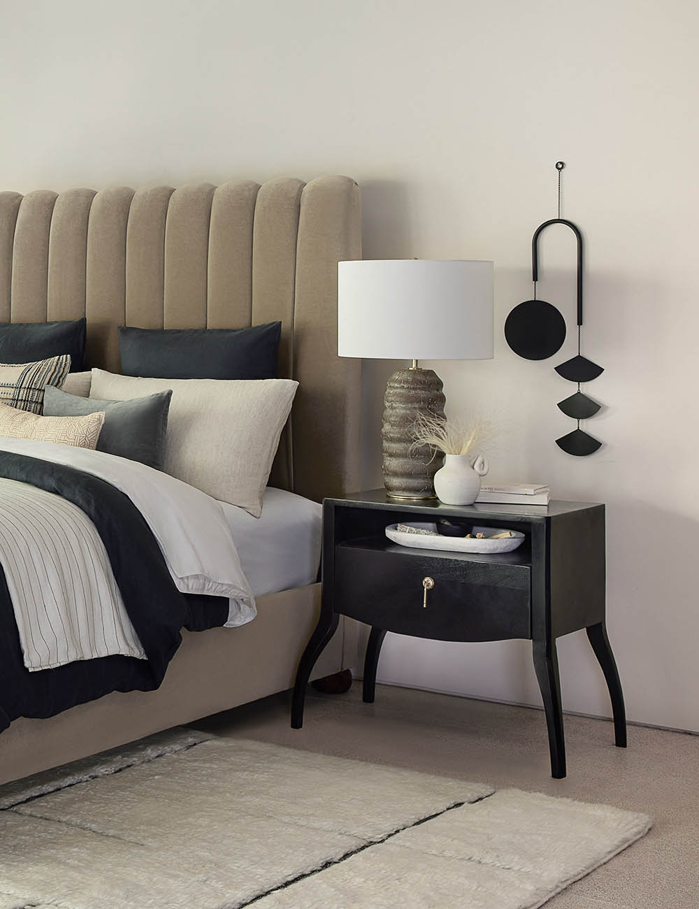Ola Ceramic Table Lamp styled in a room