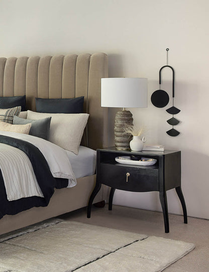 Ola Ceramic Table Lamp styled in a room