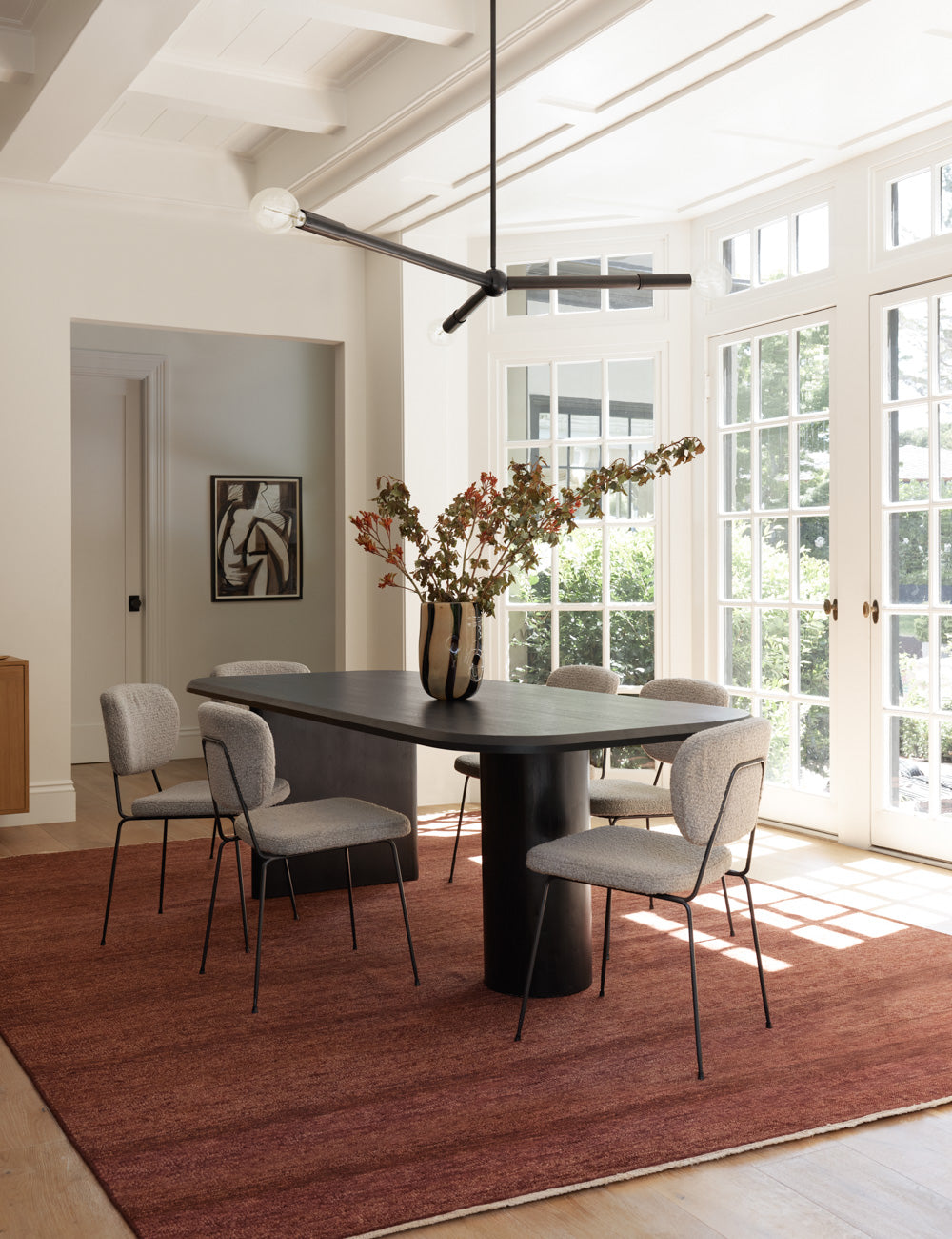 Talon Chandelier styled in a room