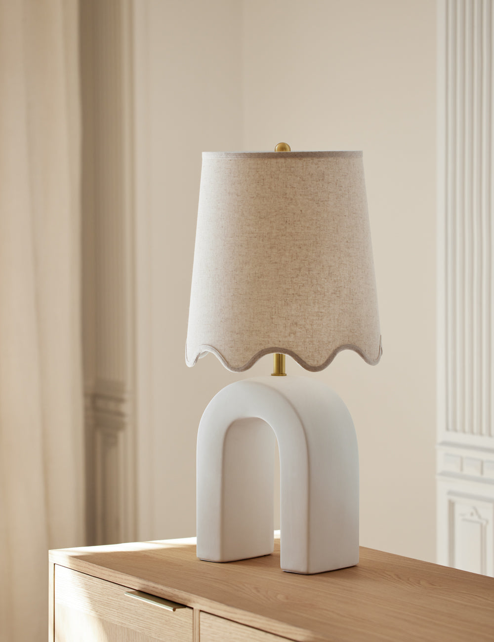 Saima Table Lamp styled in a room