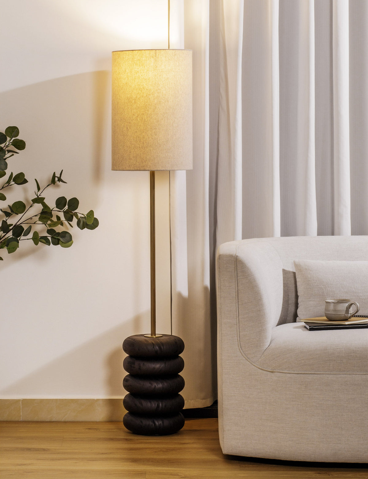 Linus Floor Lamp styled in a room