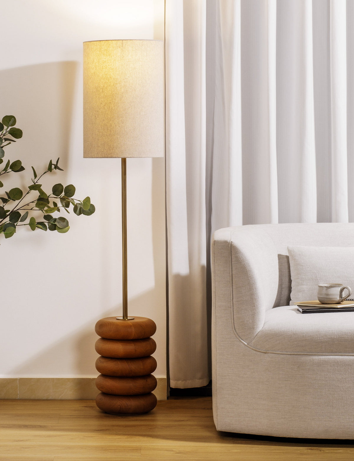 Linus Floor Lamp living room floor lamp in a styled room
