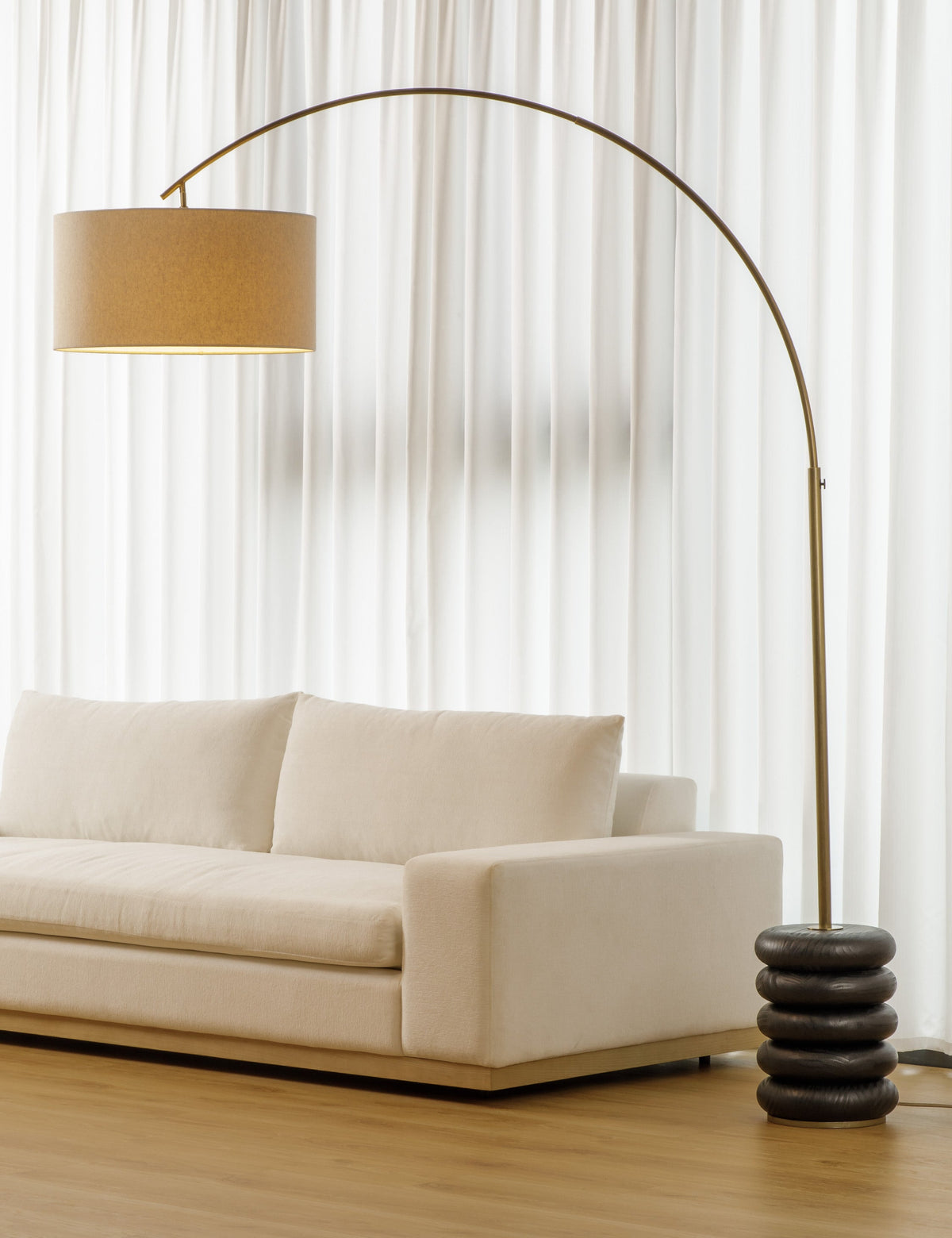 Linus Arc Floor Lamp styled in a room