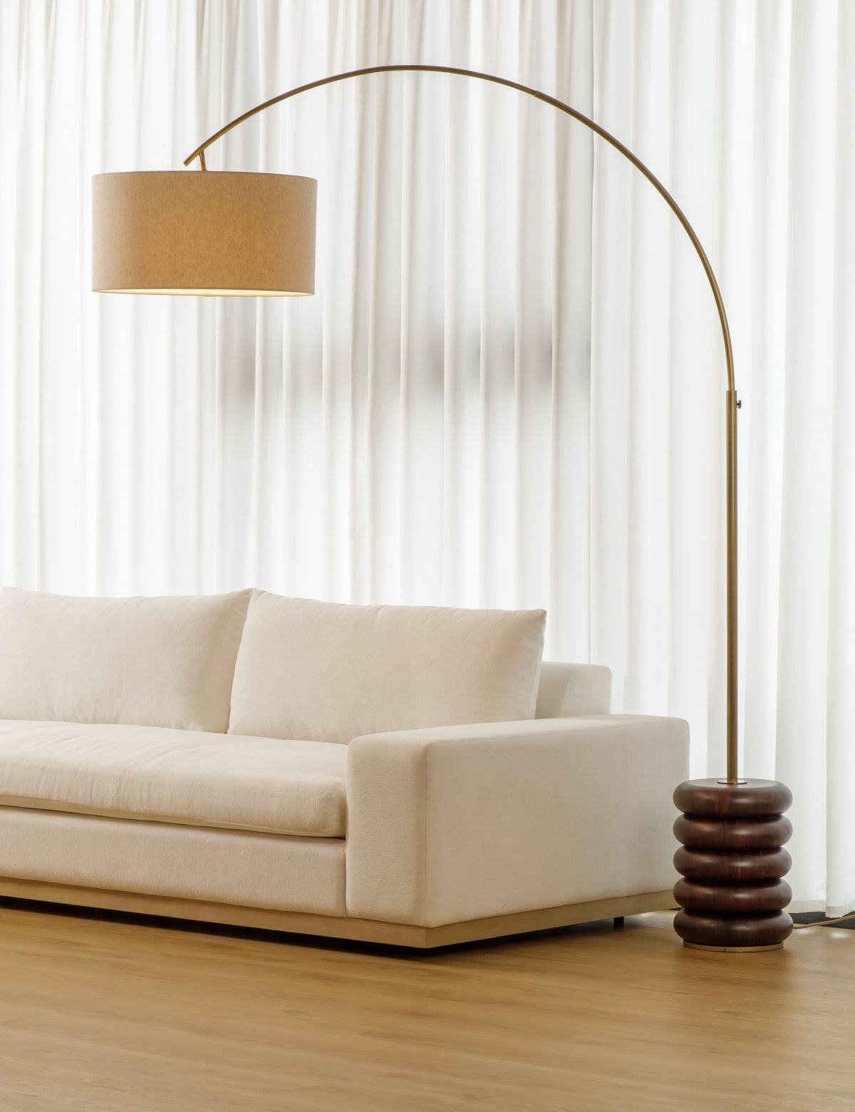 Linus Arc Floor Lamp styled in a room