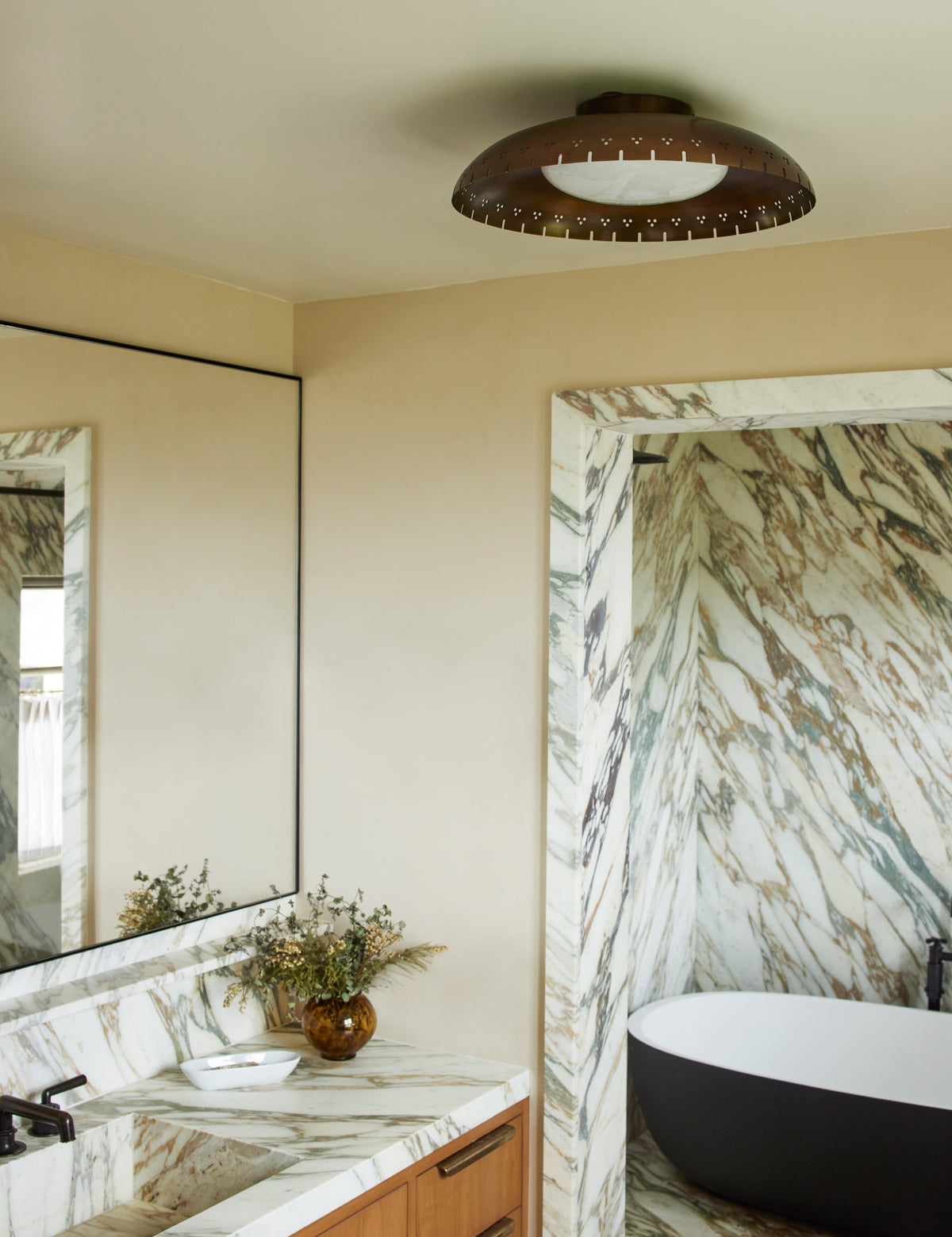 Omero Flush Mount Light ceiling light in a styled room