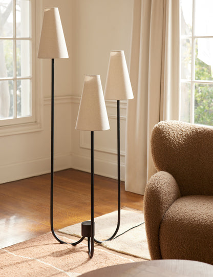 Familia Floor Lamp styled in a room