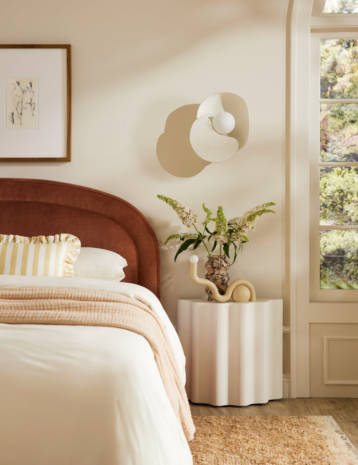 Noor Table Lamp styled in a room
