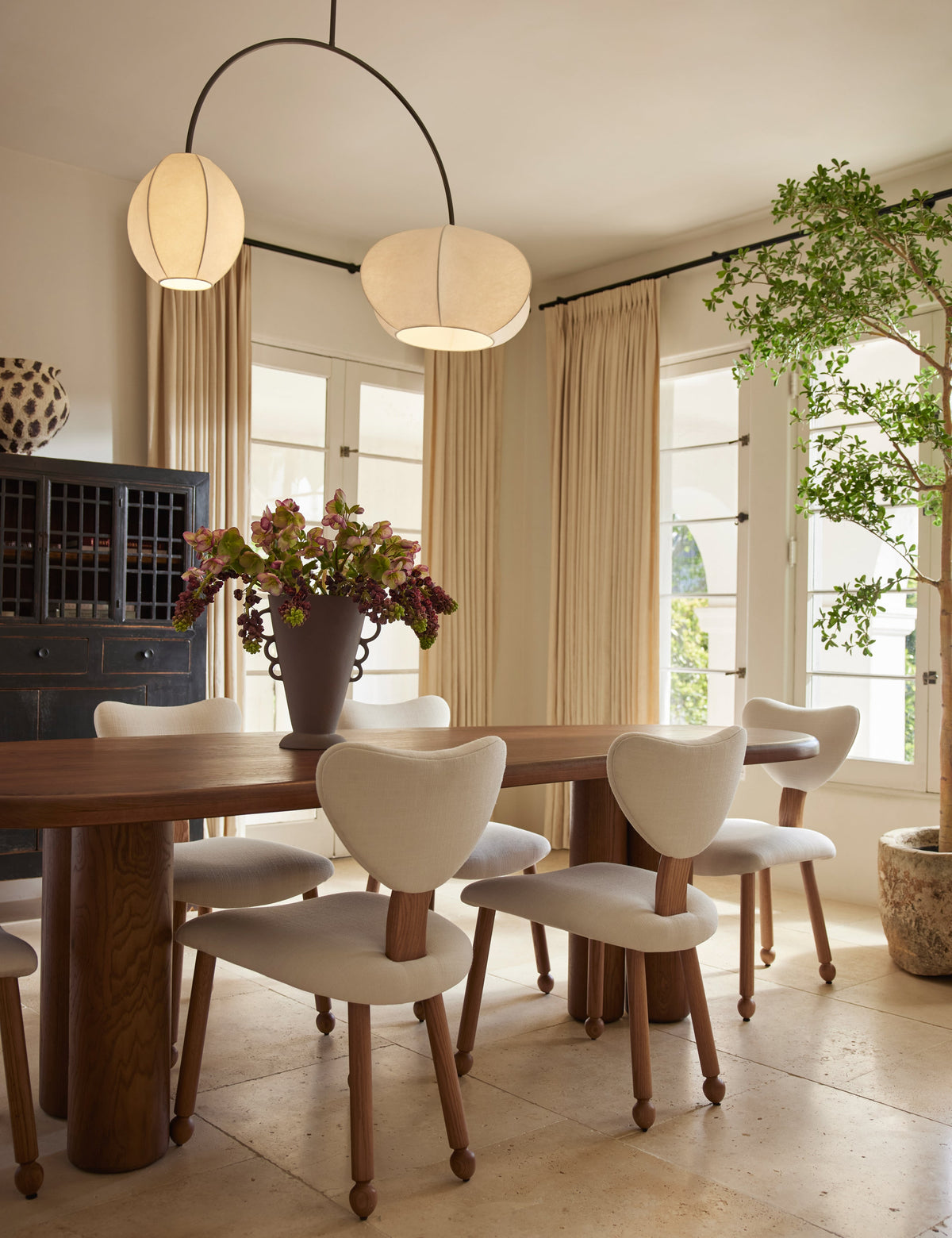 Luneth Linear Chandelier styled in a room