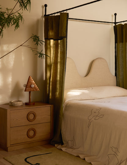 Kolmio Table Lamp styled in a room