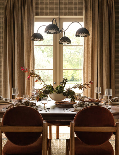 Omero Chandelier dining room light in a styled room