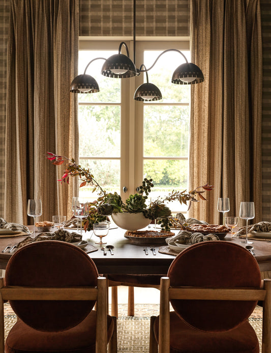 Omero Chandelier dining room light in a styled room