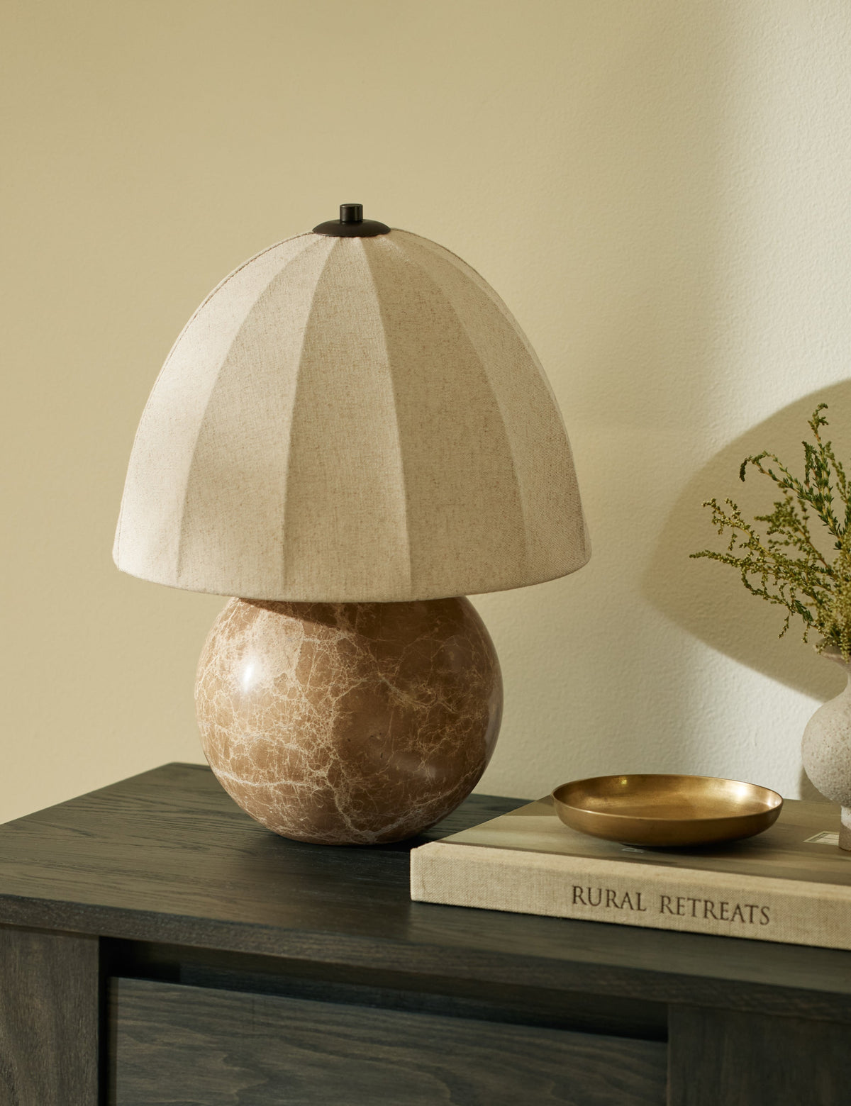 Izu Table Lamp styled in a room