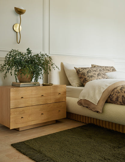 Kukka Sconce styled in a room