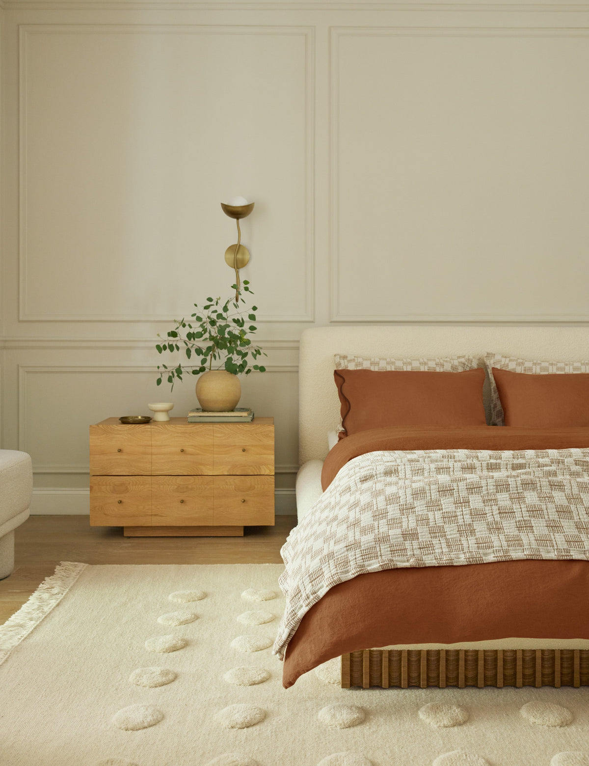Kukka Sconce styled in a room