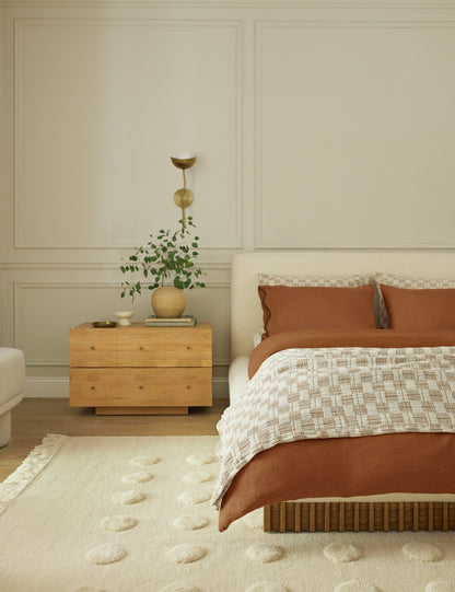 Kukka Sconce styled in a room