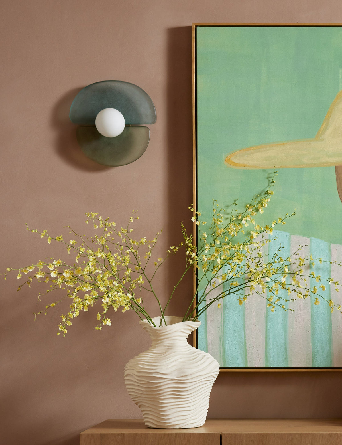 Moody Sconce bedroom wall light in a styled room