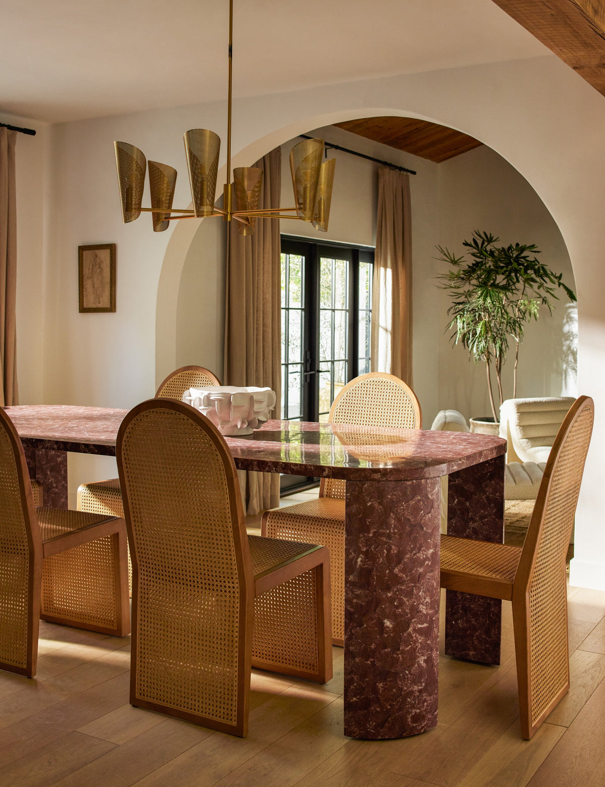 Plivot Chandelier dining room light in a styled room