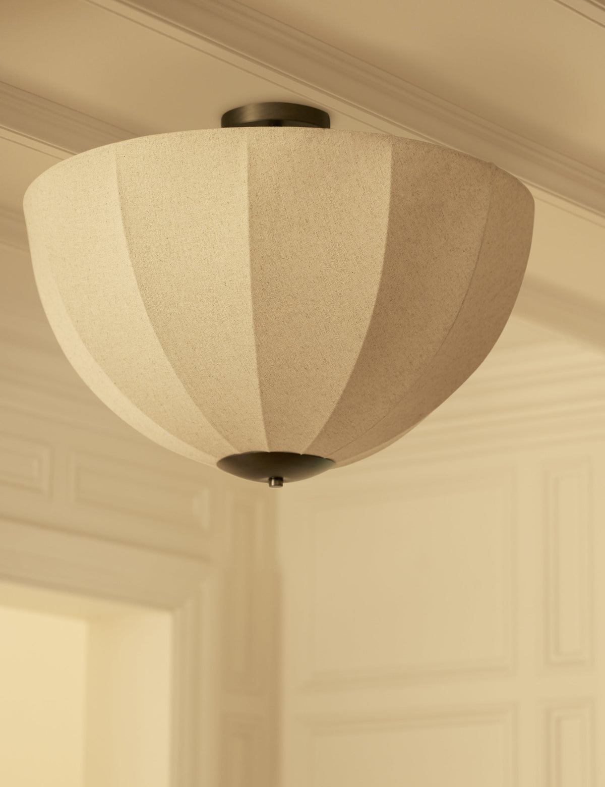 Sello Flush Mount Light styled in a room