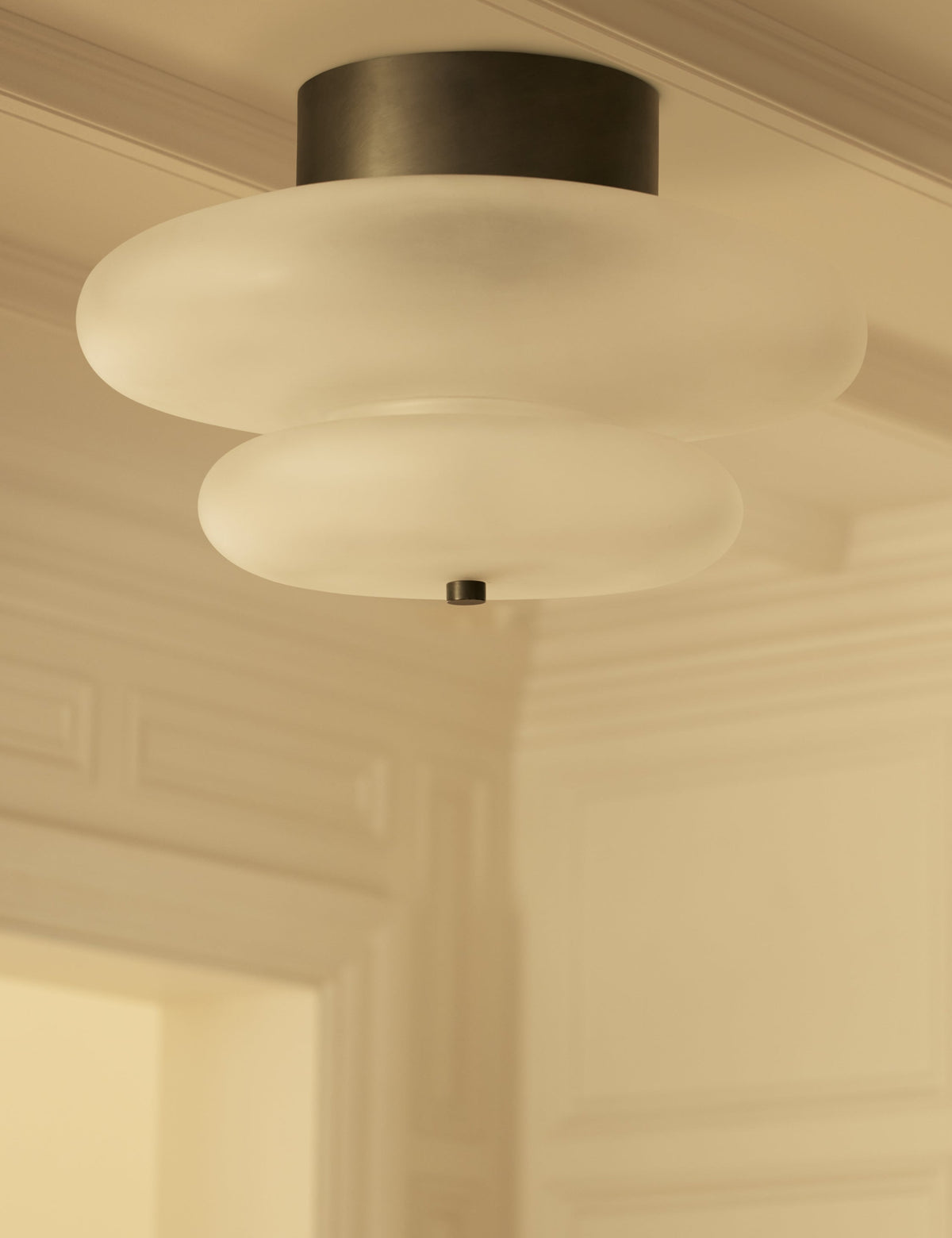 Miru Flush Mount Light styled in a room
