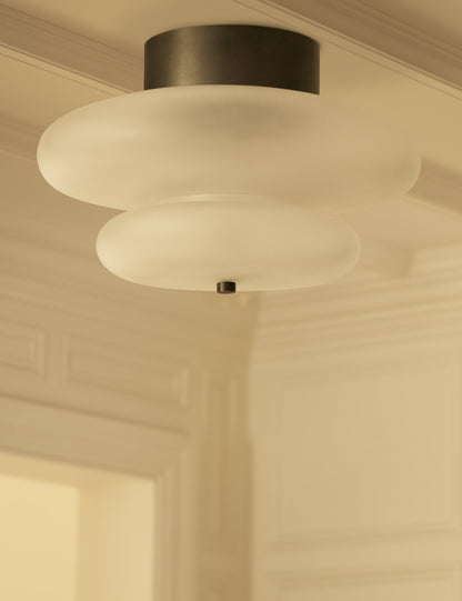 Miru Flush Mount Light styled in a room