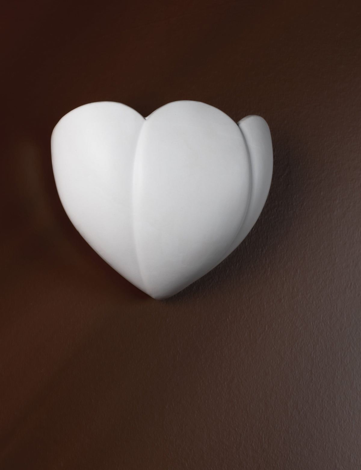 Tuli Sconce styled in a room