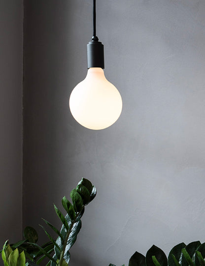 Porcelain III 6W LED Bulb (Set of 2) led light bulb in a styled room